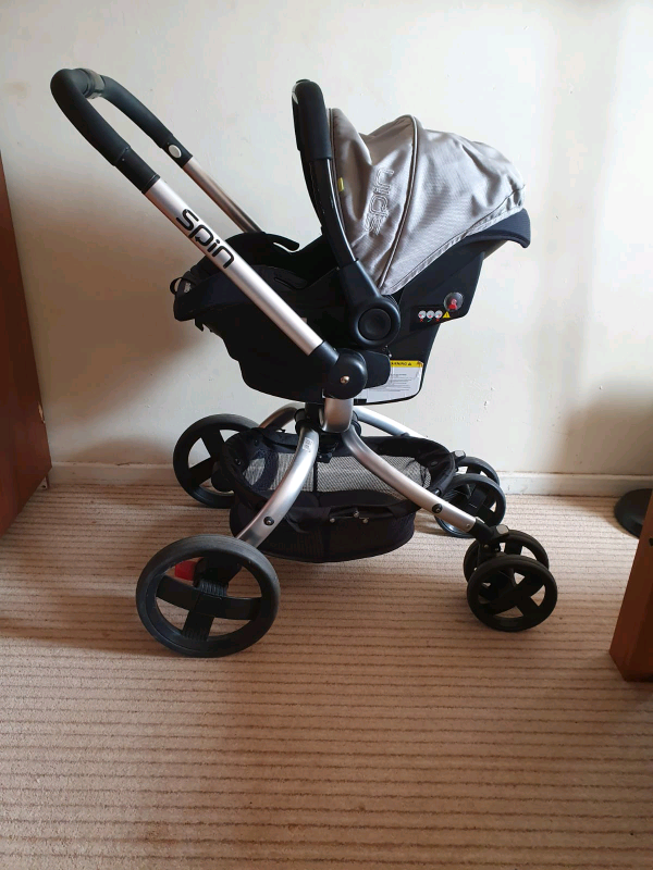 mothercare spin travel system